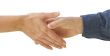 Man and woman shaking hands with clipping path.