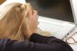 Frustrated Female Using Laptop