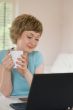 young woman working on a laptop