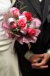 Wedding bouquet and hands