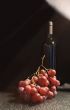 Red wine and grapes