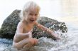 child in waves