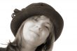smiling woman in hat