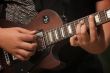 Musician Plays His Gibson