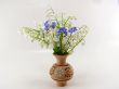 Lily of the valleies in the clay vase