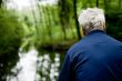 Older man overlooking a stream
