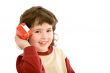 child with a toy telephone