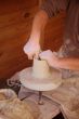 potter makes pitcher