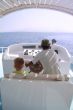 little boy and captain on the boat 2