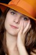 woman with orange hat