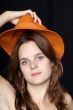 woman with orange hat
