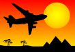 Aeroplane above pyramids