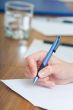 Hand with pen