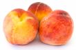 Three ripe peaches