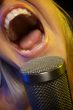 Woman Sings with Passion