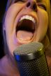 Woman Sings with Passion