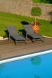 deck chairs in front of pool