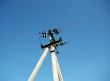 Ferro-concrete column with electric wires.