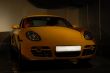 The yellow sports automobile.