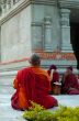 Buddhistic monk in front of stupa