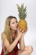 Blonde woman with pineapple