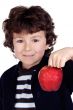 Adorable child with one apple