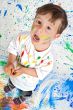 Boy playing with painting