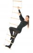 Woman on a rope ladder