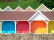 Colorful seaside beach chalets