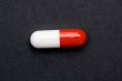 Red and white pill