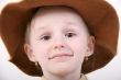 happy girl in brown hat