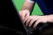 man work with laptop