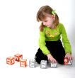 girl play with bricks