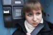 Upset girl with street phone