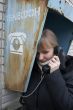 Upset girl with street phone