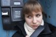 Upset girl with street phone