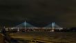 Guy bridge in night.