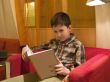 Boy readind a book