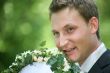 Groom with bouquet