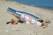 Message in a bottle with SOS signal