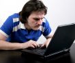 man work with laptop