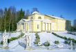 Wooden classical building in winter