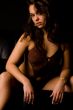 Brunette is wqaiting on the bench