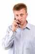 serious man with mobile phone