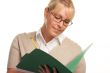 Beautiful Woman with Pencil and Folder