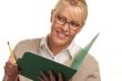 Beautiful Woman with Pencil and Folder