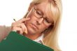 Beautiful Woman with Pencil and Folder