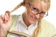 Female With Ponytails Reads Her Book