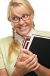 Cute Student with Retainer Carrying Her Books
