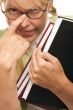 Cute Student with Retainer Carrying Her Books